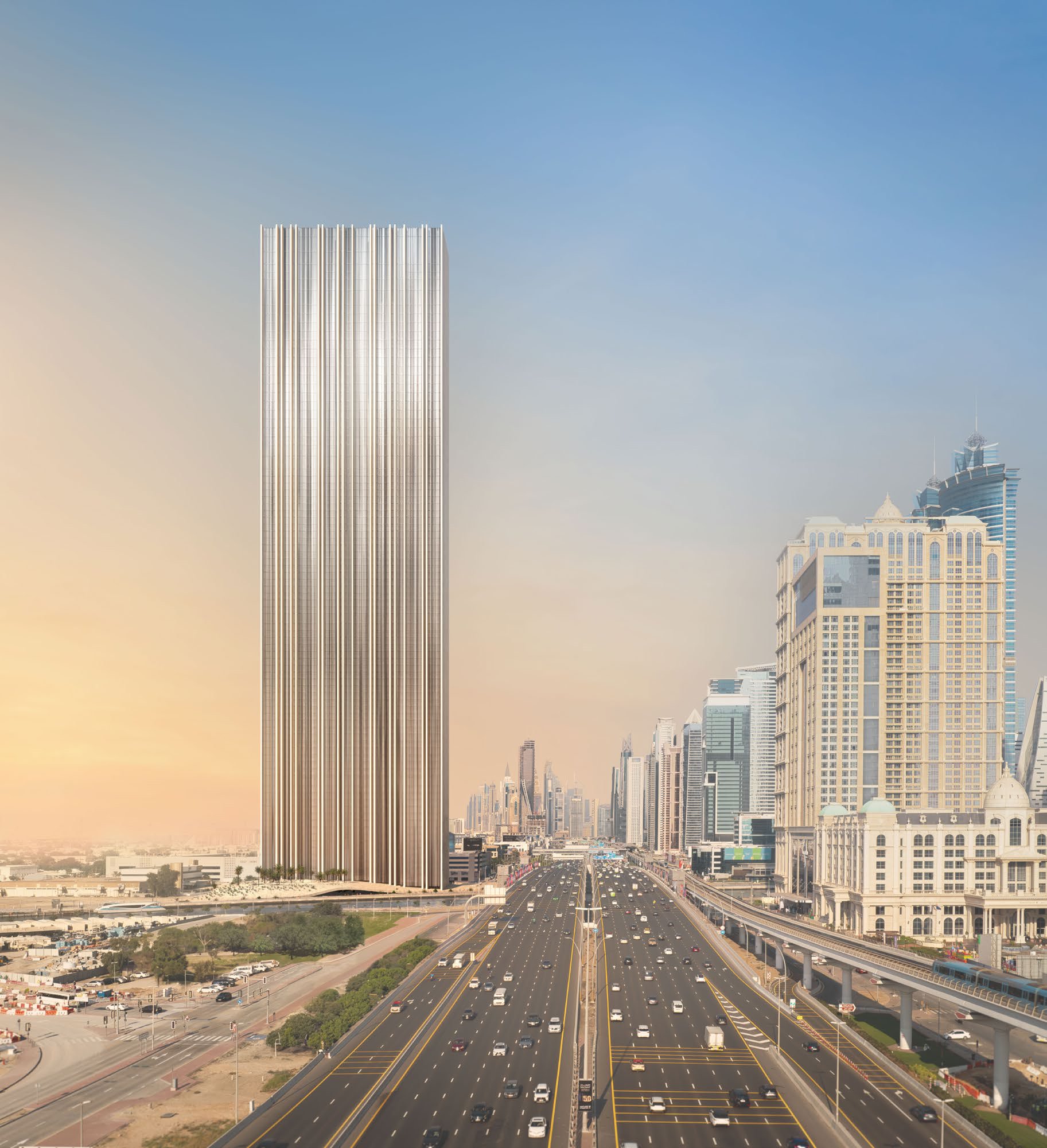 The tall, slender tower beside Sheikh Zayed Road at sunrise